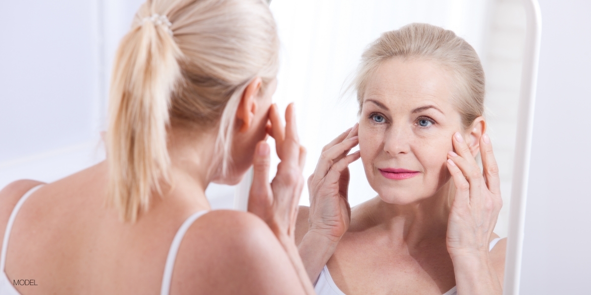 Admiring Patient with Blepharoplasty and Facelift Procedures